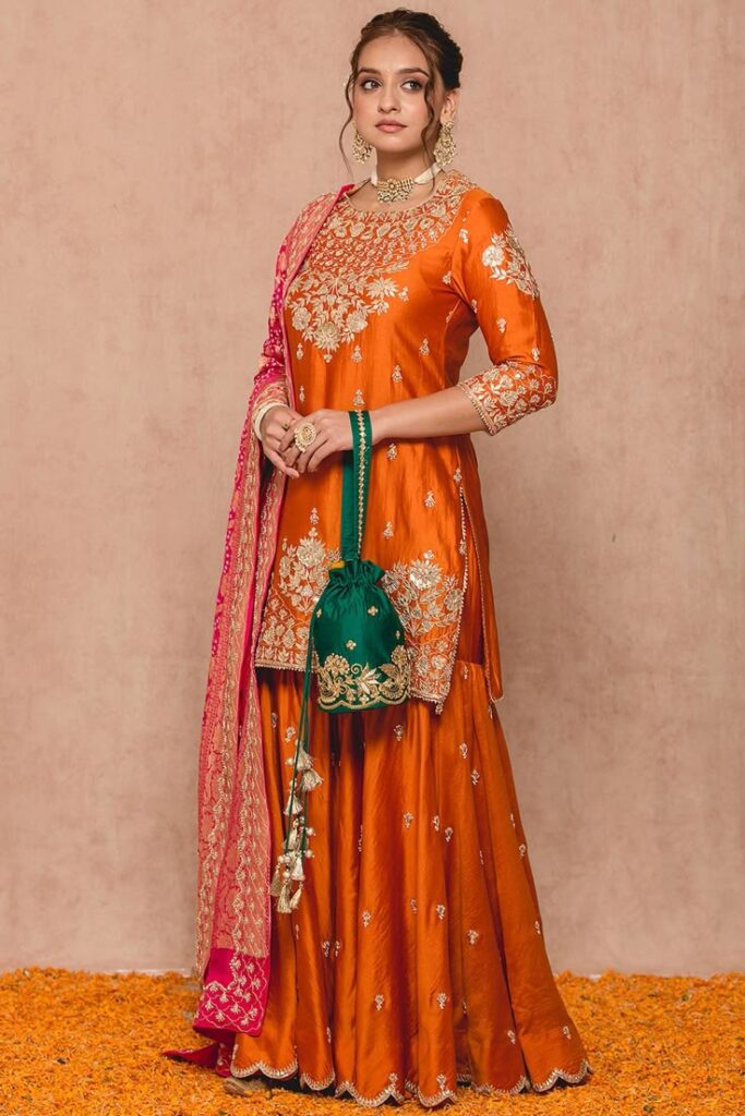 orange banarasi sharara set by surbhi shah at pernia's pop up shop 2025
